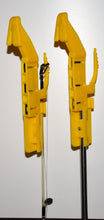 Two  CatchALure conventional fishing lure retriever devices on different fishing poles.